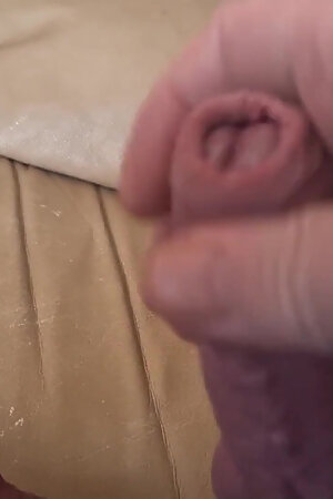 My Friend Is Lying on the Couch Jerking off His Cock Until He Orgasms