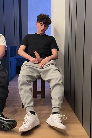 Two lads jerk off uncut dick and cum