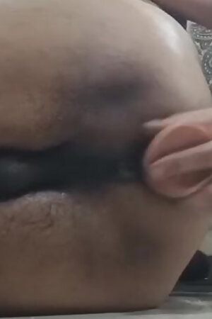 Using a dildo with complete masti