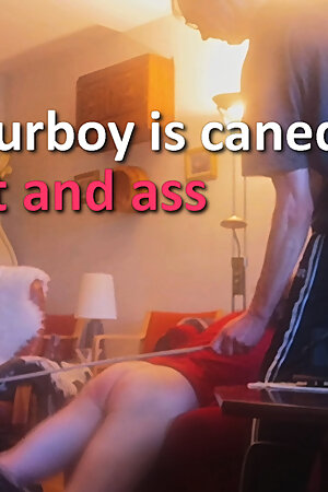 Amateurboy is caned on feet and ass