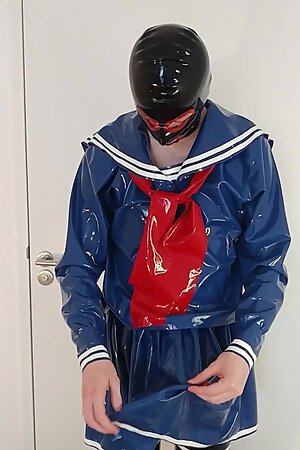 Putting on blue latex Japanese sailor uniform skirt and shirt, rubber maid stockings