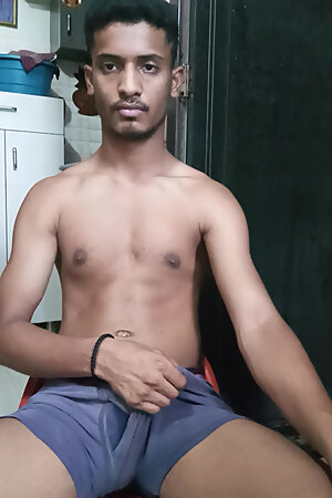Indian young man massaging big on webcam