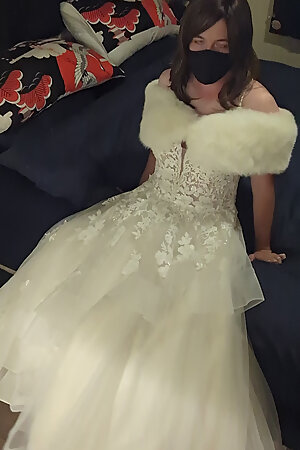 Making love to bride's luxurious wedding gown and white fur shawl