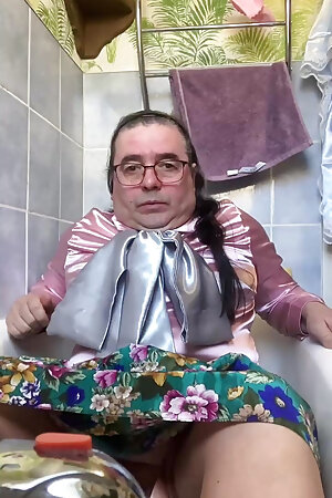 In bourgeois attire to take a piss shower