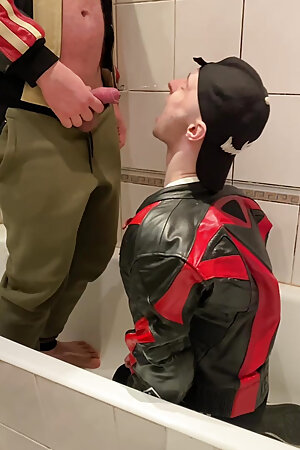 Big Man in Leather Jacket Pissing on Leather Moto Biker