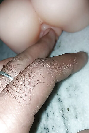 Boy play with sex doll pussy