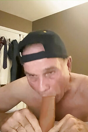 bikeman exposed  sucking dildo