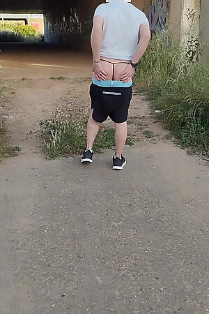 In Showing Her Ass in a Thong