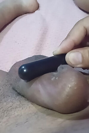 I masturbate my big cock with a sock in my bedroom.