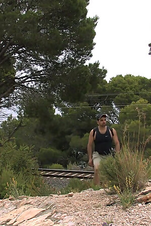 Two hairy bears fuck in the cruising area.