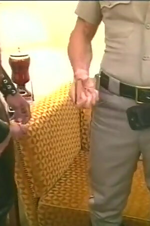 Muscular horny bear in leather chaps gets his cock slurped by police