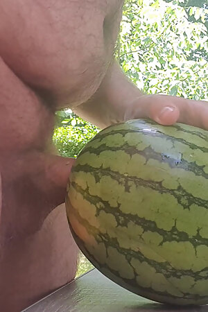 Horny nudist fuck melon at home in the garden