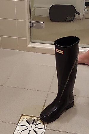 Pissing in her Hunter boots