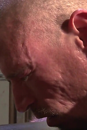Muscular older man gets his asshole pounded deep and creampied by a young dude with pierced cock