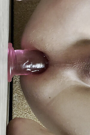 Sissy slut rides huge dildo