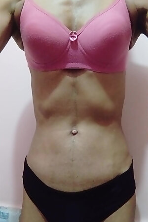 Sissy wearing pink bra and red panty