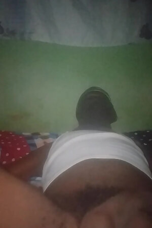 Flashing his big black ass.