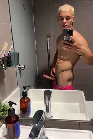 Handsome Blonde Fingering His Dick in the Train Toilet