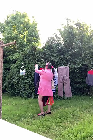 In an outfit with a little pink button dress to go pick up my laundry.