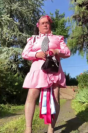 In an outfit with a little pink button dress for an evening.