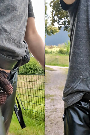 Gay man walking through the city in a thong