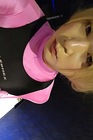 A cross-dressing boy in pink full-body tights masturbated while feeling it with his nipples.