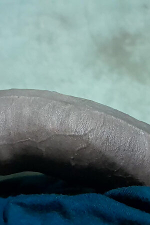 Hard black cock handjob