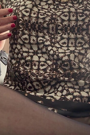 Schnucka pampers herself in a satin dress