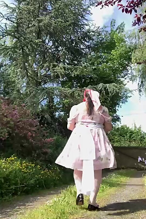 In an outfit with a little babydoll dress for a day