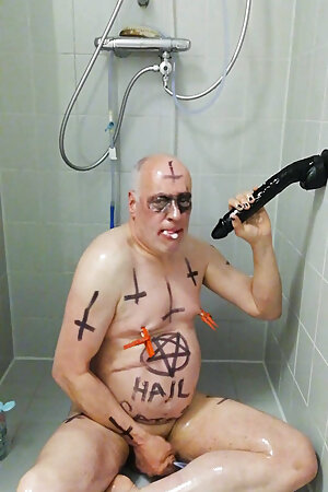 satan slave takes oil session during enema treatment