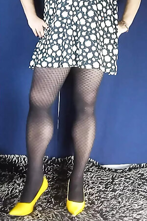 Checkered tights, high heels and mini dress