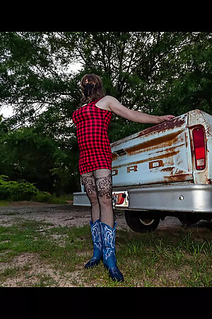 Jon Scarecrow Big Fake tits Crossdresser in Snug Plaid Dress and Cow Girl Boots Outside